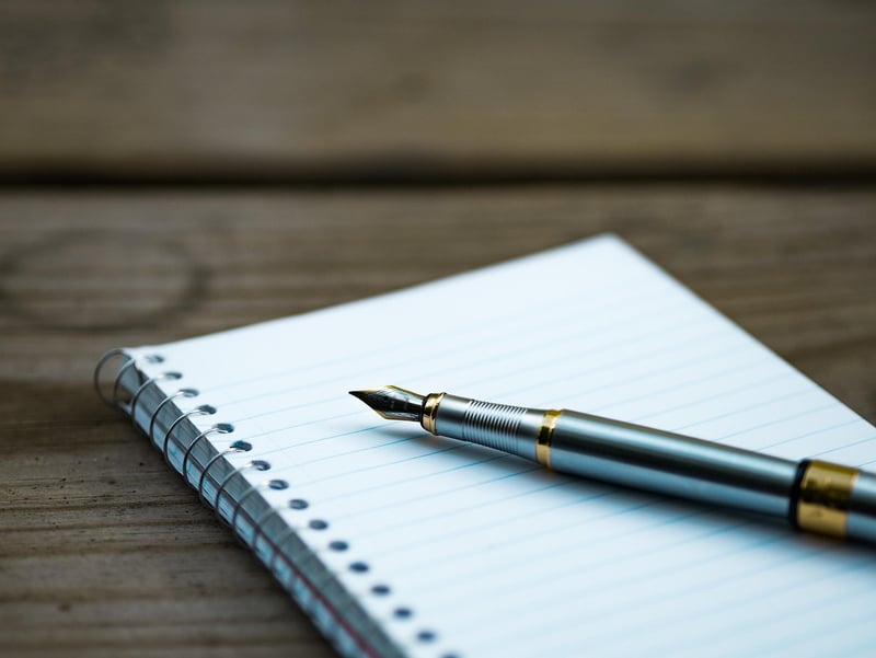Pencil and notebook - essential tools for writers